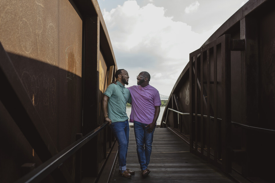 A couple poses in Crescent Park for engagement photos. | Photo by Swanson Photography