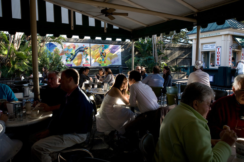 Engagement Photo at Cafe Du Monde in New Orleans French Quarter | photo by Jessica The Photographer