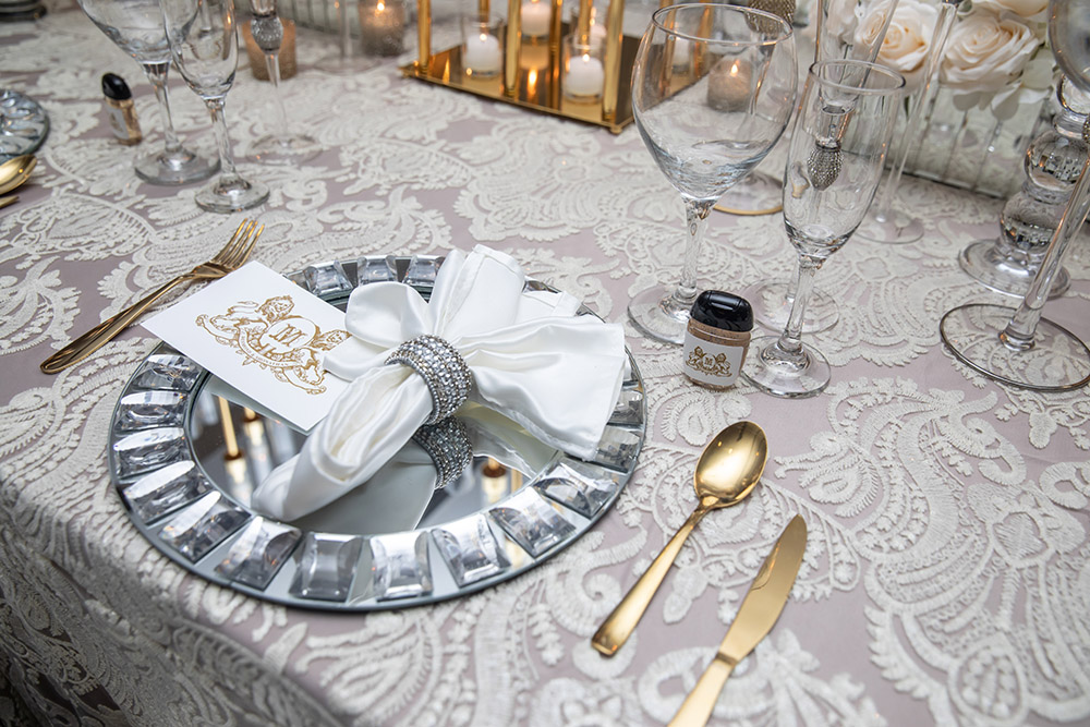 Place setting in silver and gold.
