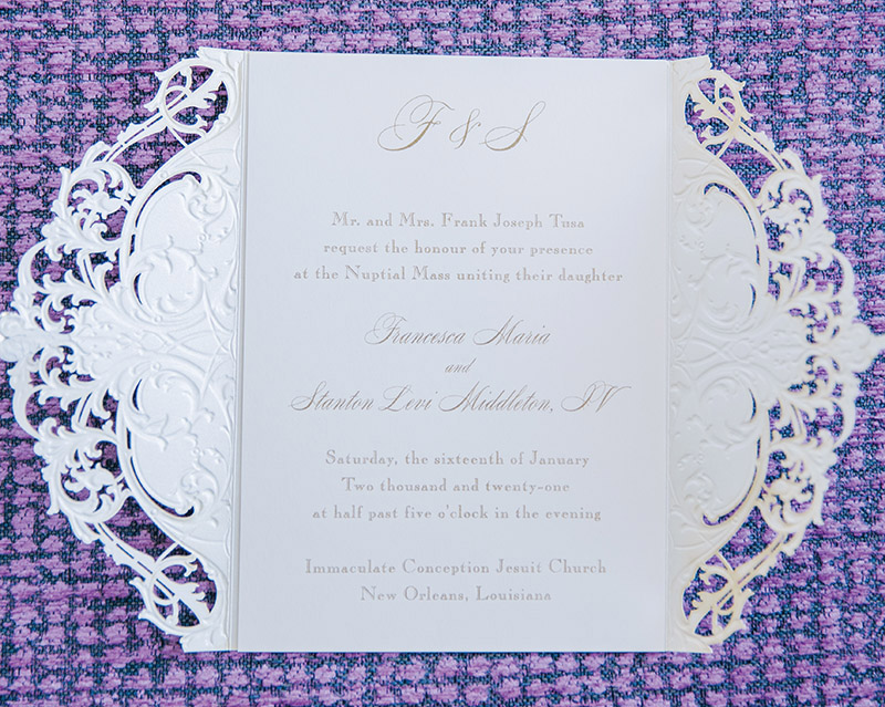 The lace, laser cut invitations by Rudman's Gifts.