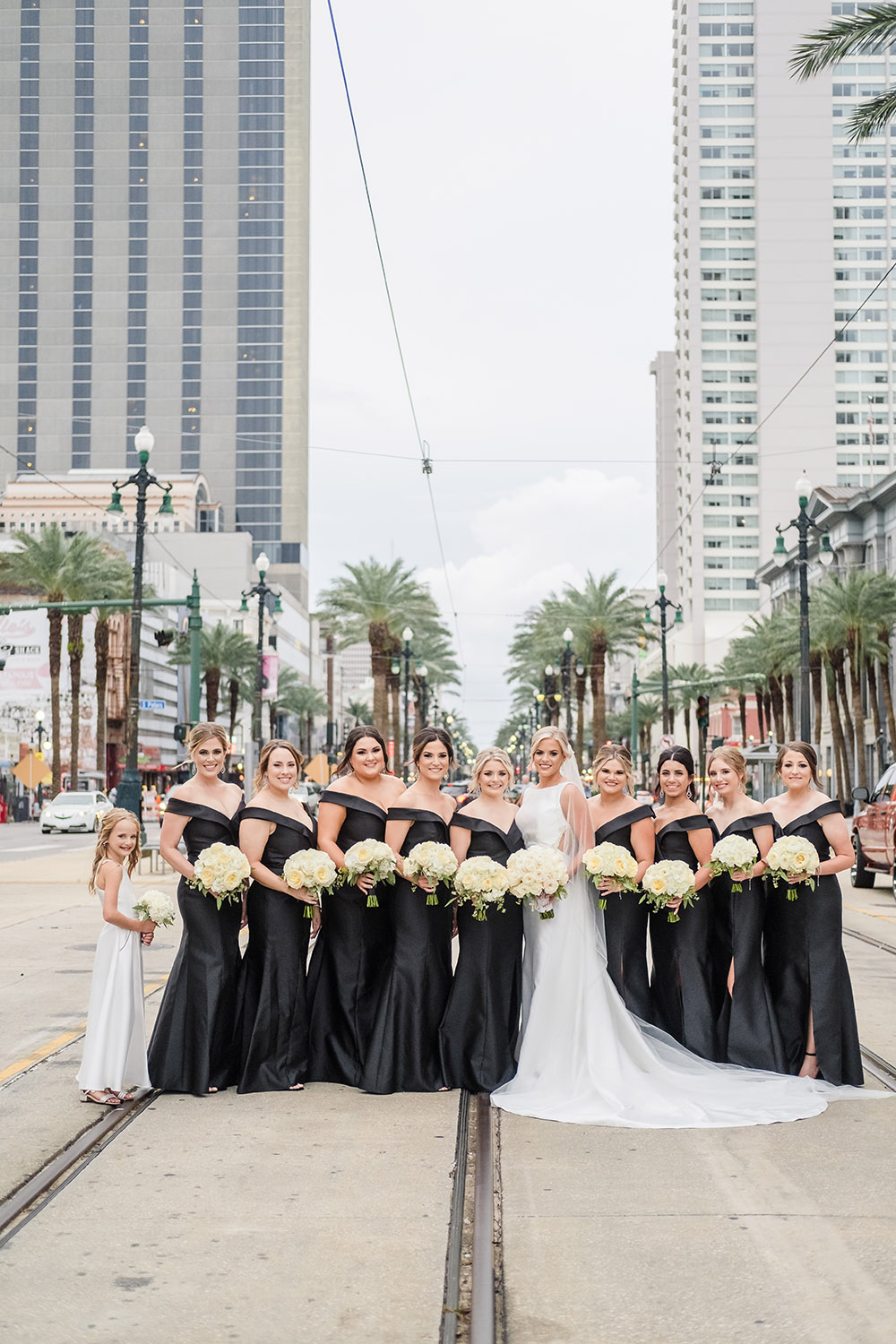 bride and bridesmaids on canal street