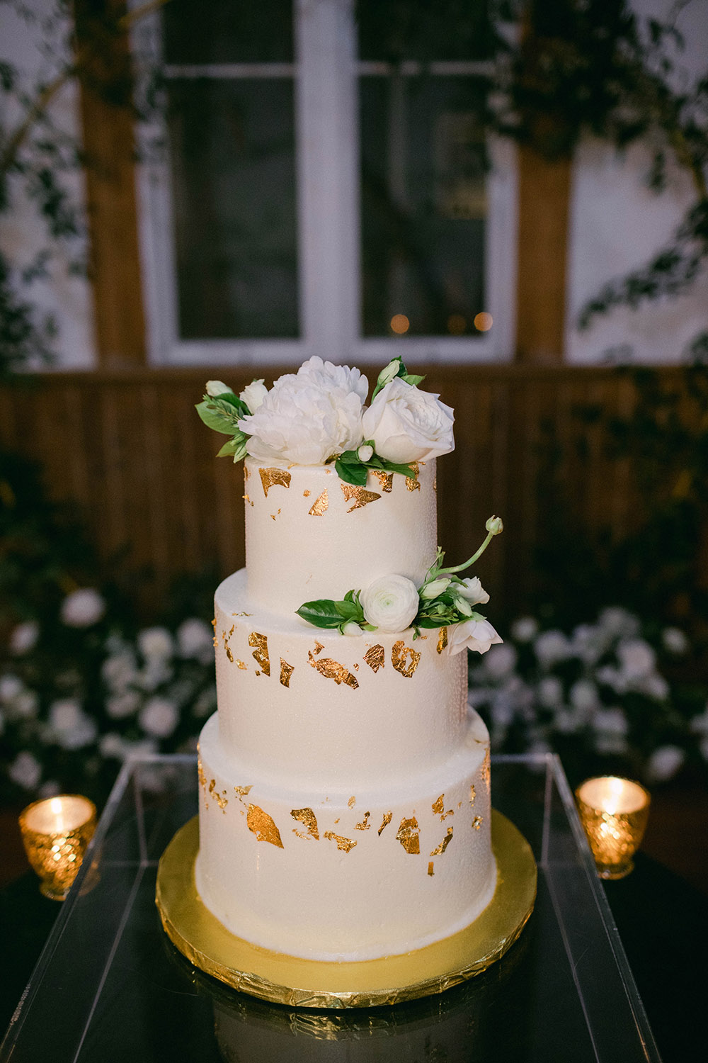 the wedding cake with edible gold leaf