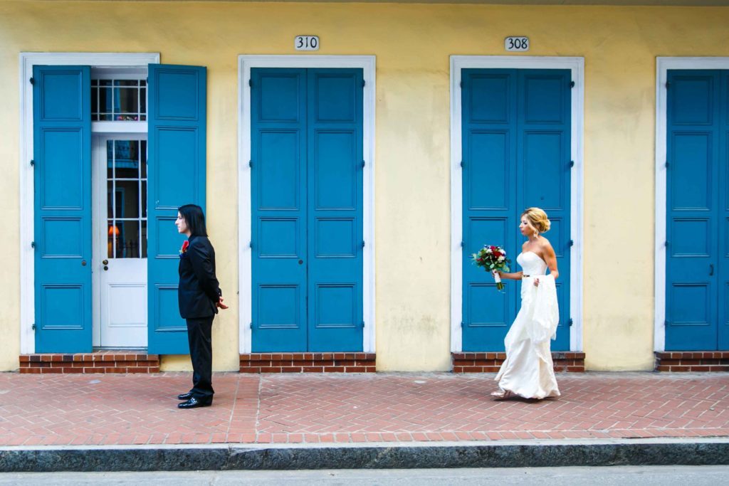 Sara walks towards Christoper for their first look in the French Quarter.
