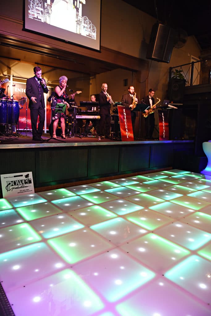 One of the highlights of the show was the illuminated LED Dance Floor in the Big Room from our sponsor Power Productions. The dance floor looked amazing in front of the stage. Entourage Band performed throughout the show keeping the mood fun and upbeat!