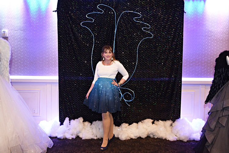 Guests had fun posting with the "neon" angel wings photo opp at the show.