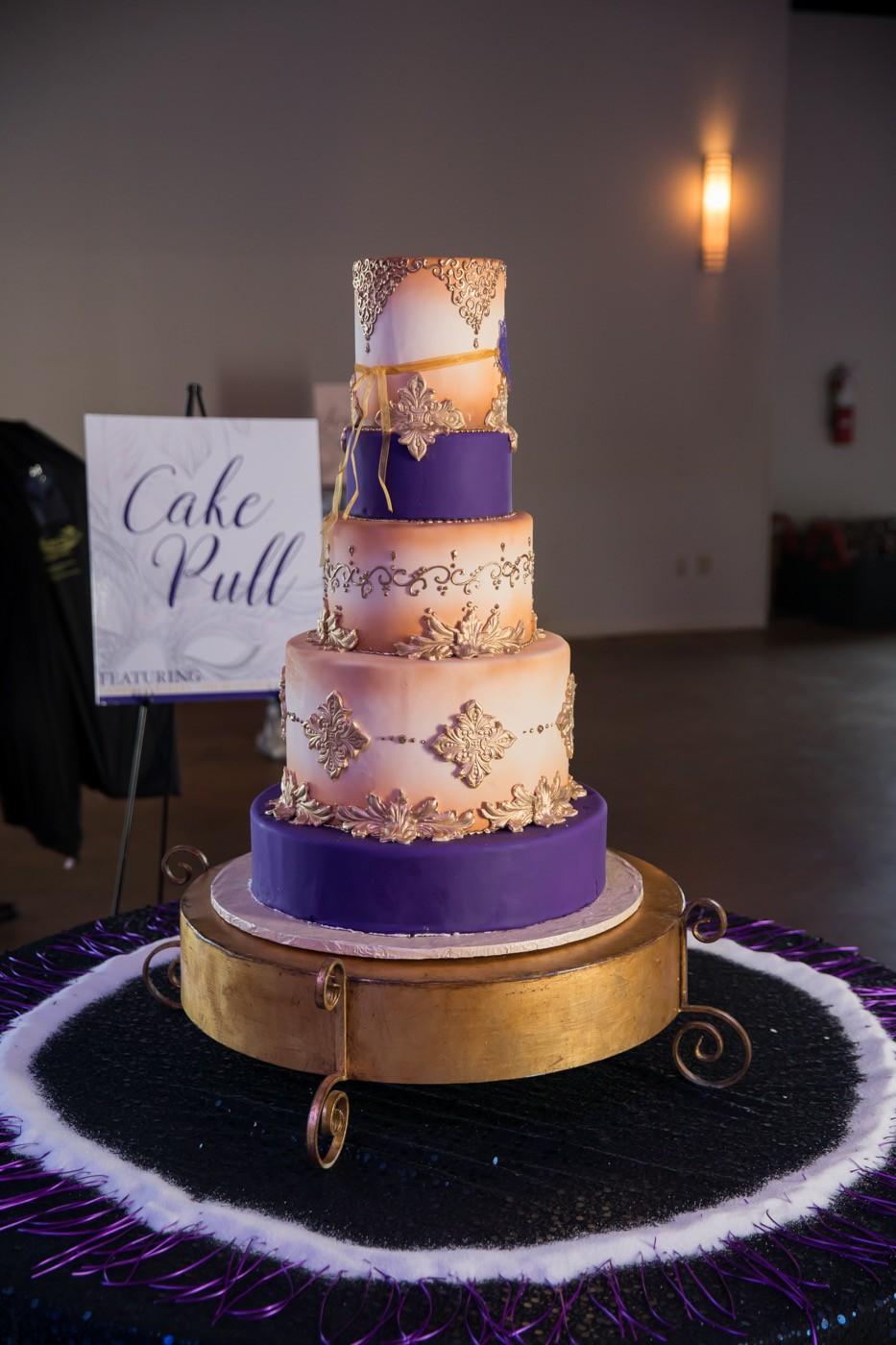 Gambino's Bakery purple and gold mardi gras wedding cake. Photo: Brian Jarreau Photography