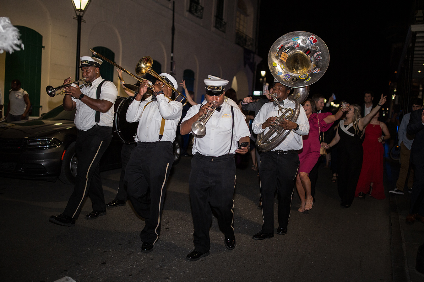The reception ended with a traditional New Orleans second line through the streets of the French Quarter.