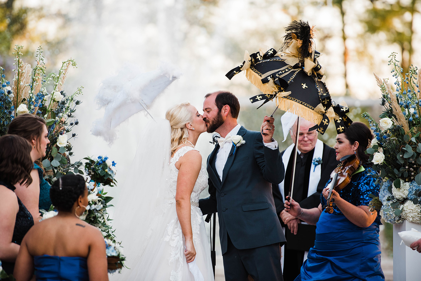 After the ceremony, Kate and Jeremy led their family and friends in a second line around Popp Fountain to “When the Saints Go Marching In”.