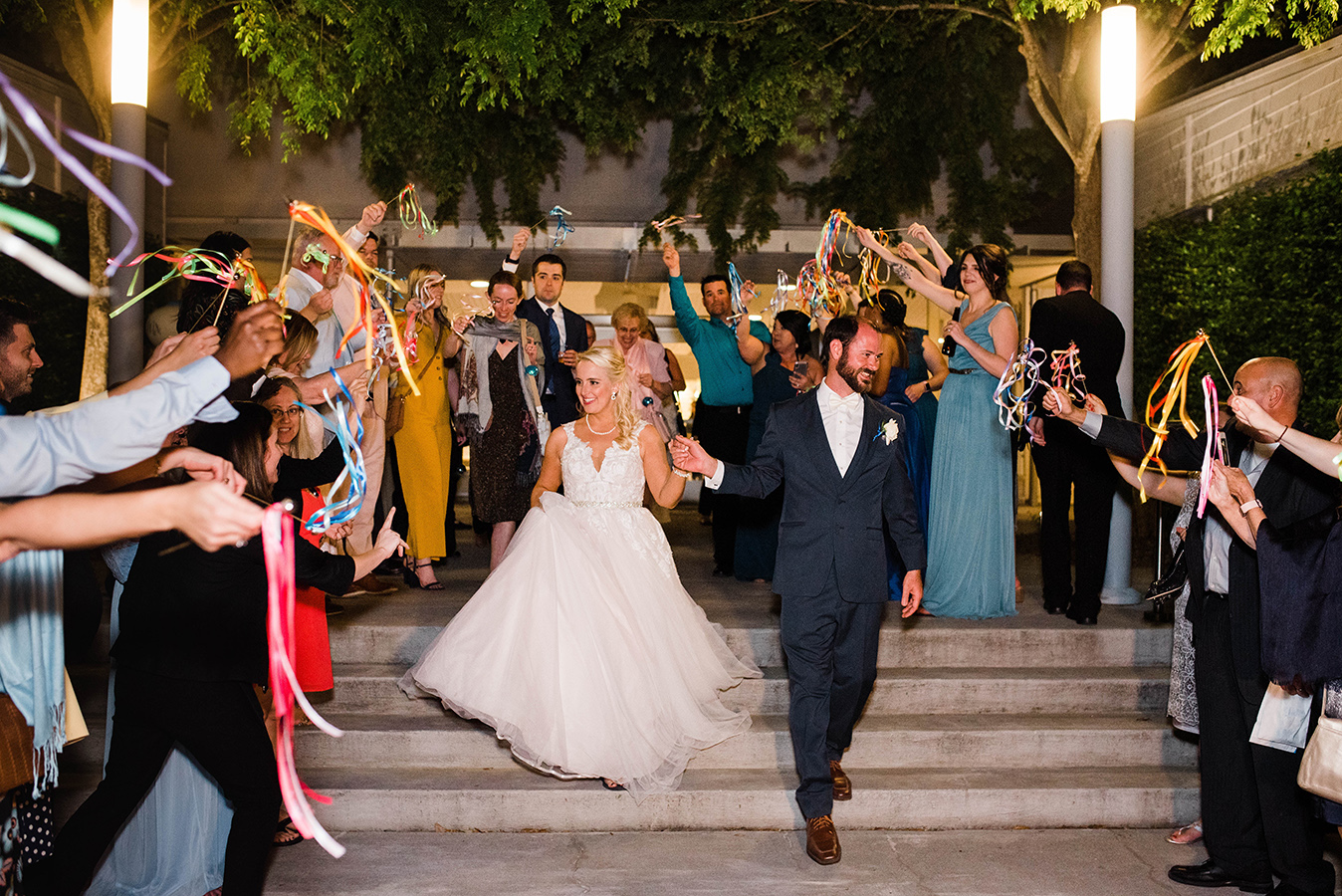 Kate and Jeremy's reception ended with a colorful ribbon send off.