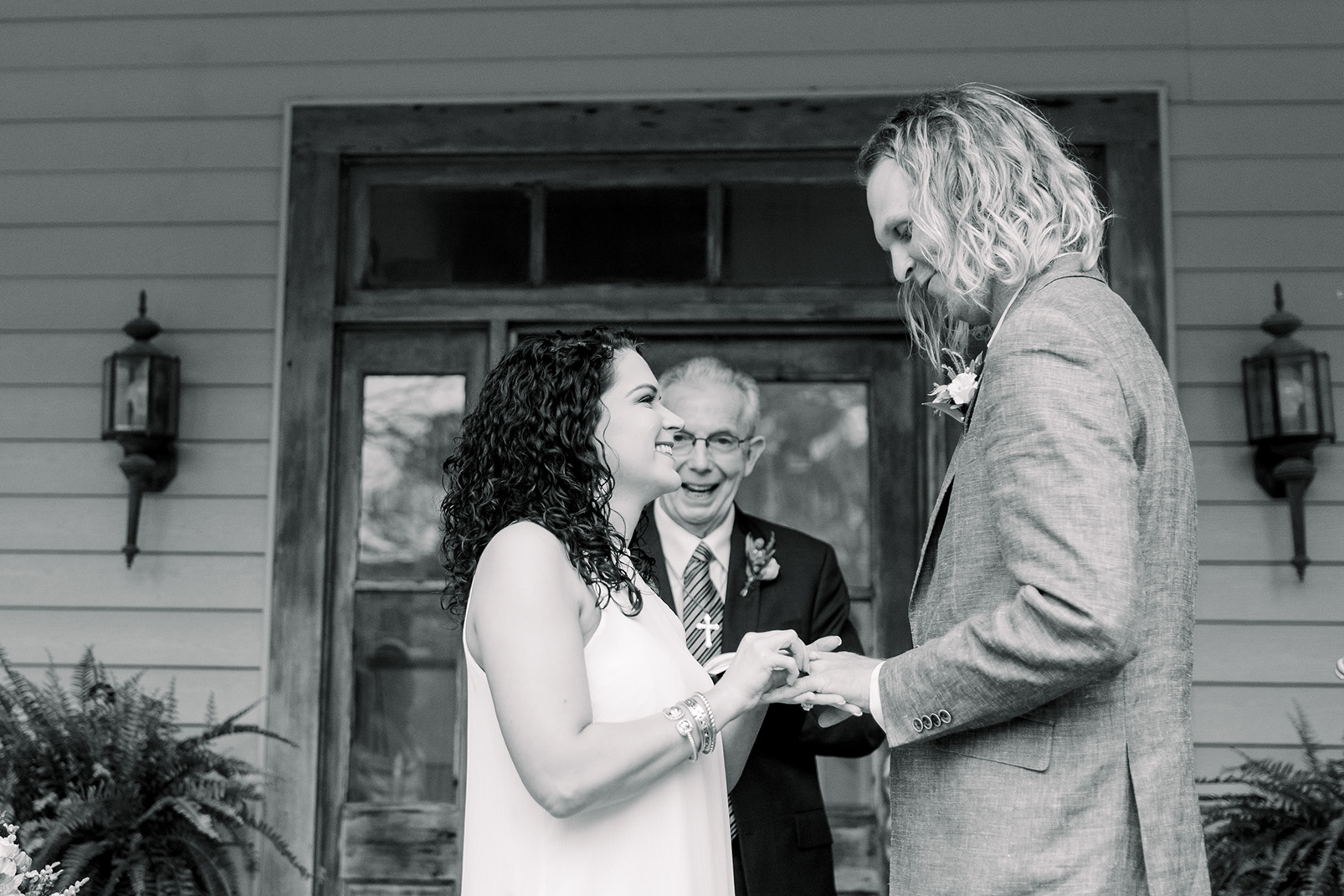 Chelsea and Wesley exchange vows on their original wedding date. Photo by Sarah Alleman Photography.