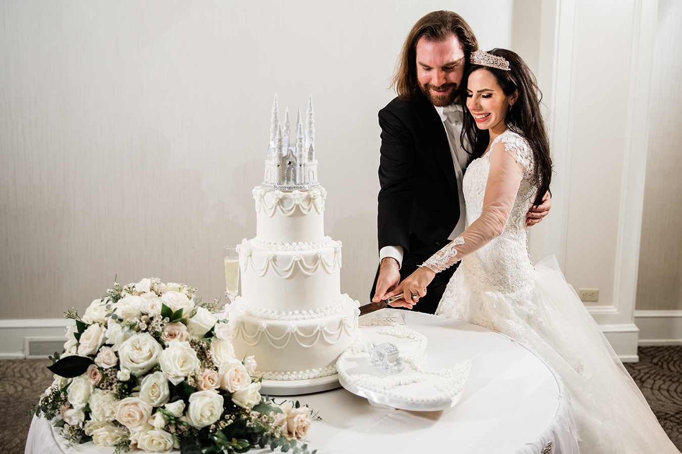 Jess’ 3-tier wedding cake was fit for a princess - complete with a castle and royal carriage! - and featured decadent flavor profiles, including white velvet and apricot champagne and Italian cream and pistachio.