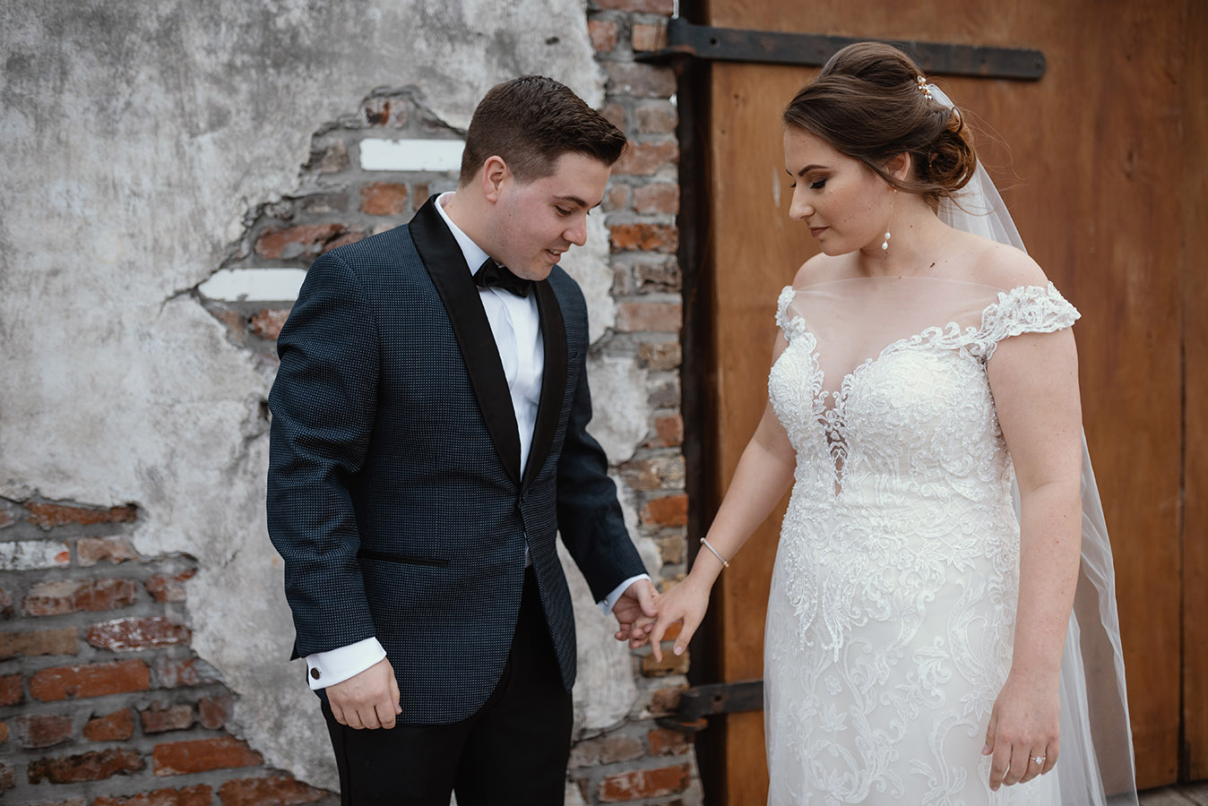 Jeanne and Dan met outside of Race and Religious for a first look and then posed for portraits around the eclectic property.