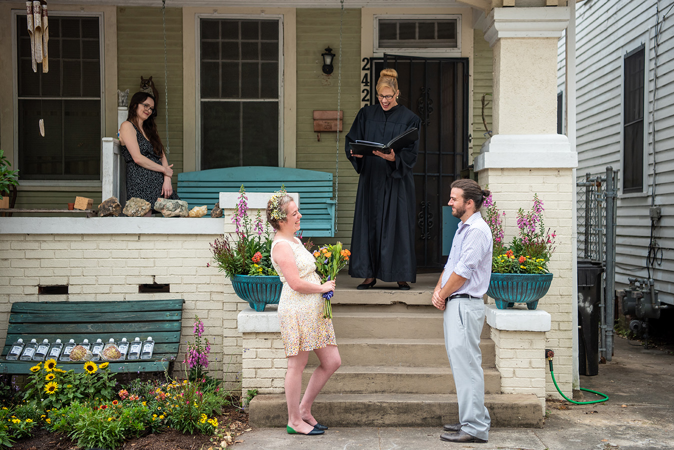 Elizabeth and Greg's ceremony took place on the front porch of their house in Treme with Diane Lundeen officiating.
