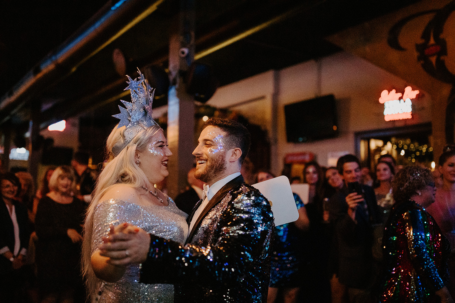 A couple wearing glitter from the Glitter Buffet dance. Photo: Gabrielle Hail