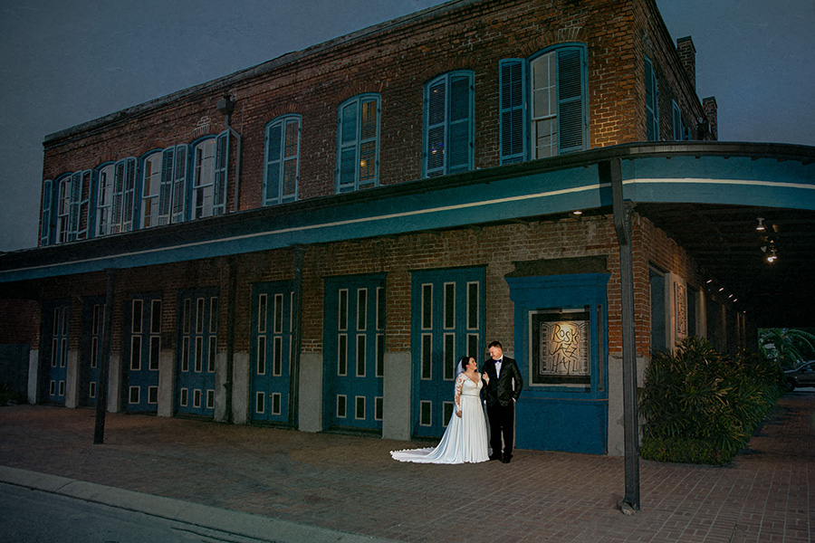Jen and Jason took a few moments to take photos together before the wedding. They were sure to grab a photo outside their venue, Rosy's Jazz Hall.