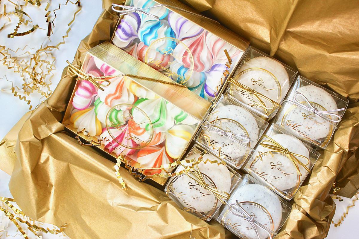Boxes of colorful meringue kisses and meringue cookies by Lord of Meringues
