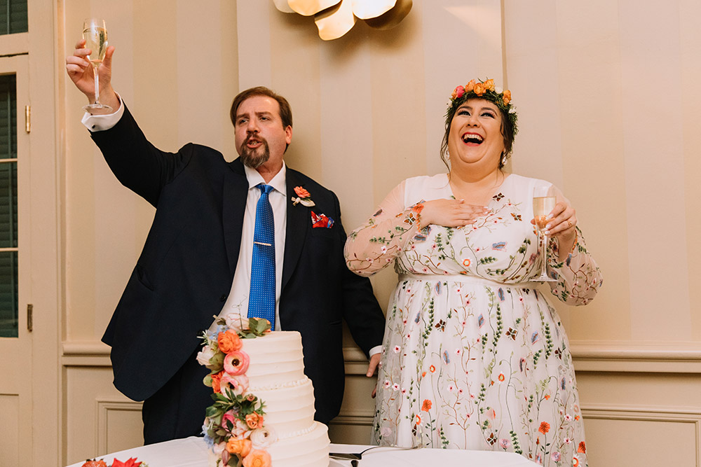 Del and Peter toast their guests during the cake cutting at their reception. Photo: Ashley Biltz