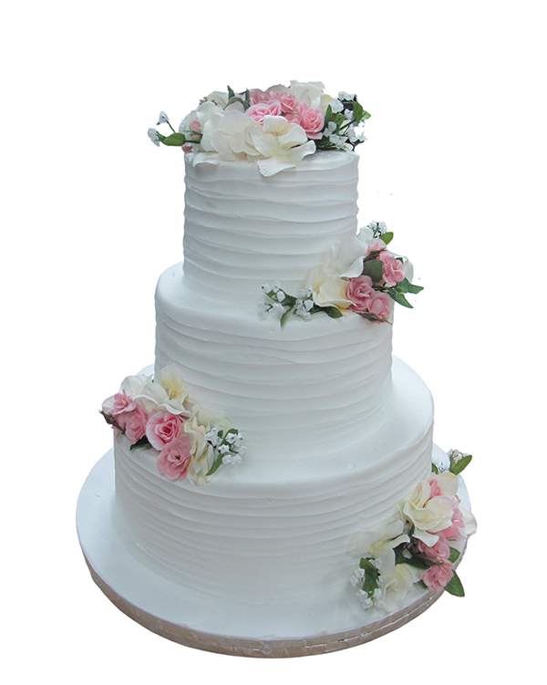 White wedding cake with texture and flowers by Haydel's Bakery