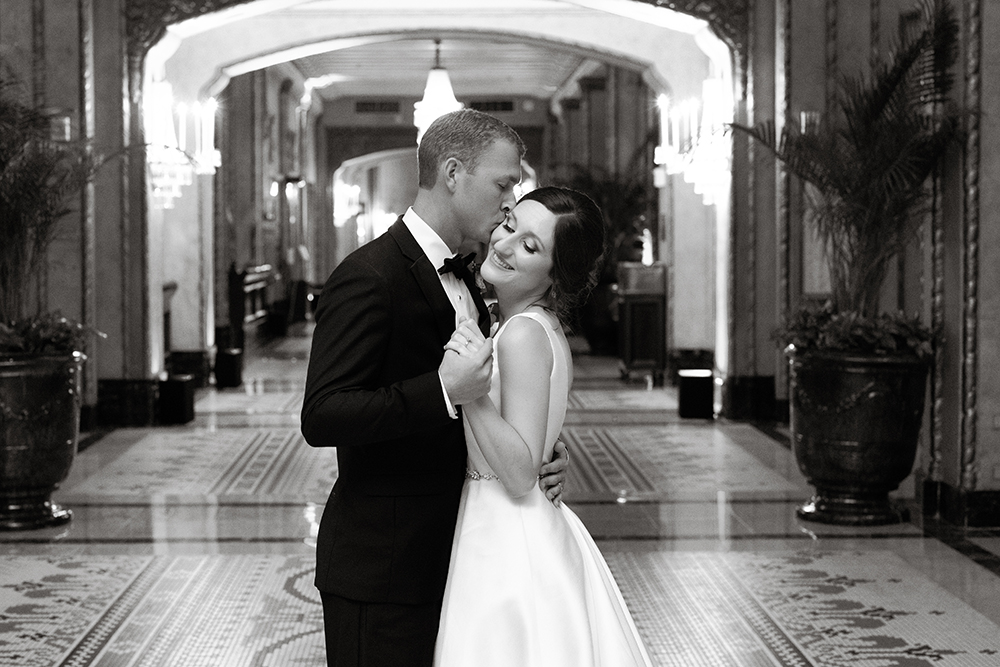 Bride and groom in the Roosevelt New Orleans lobby by Eau Claire Photographics