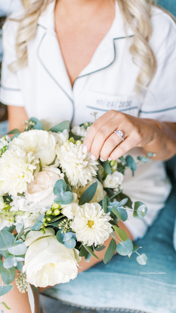 bridal bouquet and wedding ring