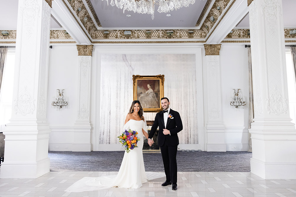 The bride and groom in Le Pavillon Hotel's ballroom