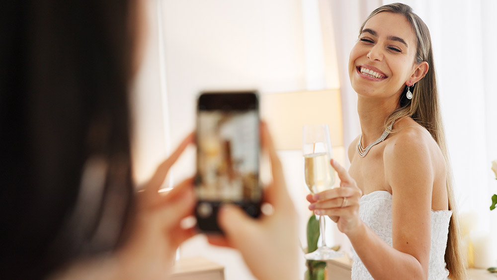 Bride being filmed for social media post