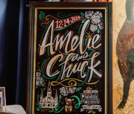 Chalkboard sign with “12-14-2024 Amelie loves Chuck,” roses, church art, and House of Blues New Orleans wedding details.