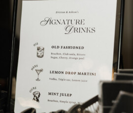 Louisiana wedding drink menu with hand-drawn cocktails under His, Hers, Ours; black straws in foreground.