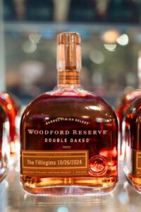 Woodford Reserve Double Oaked bourbon, custom-labeled for The Fillingims, on display—ideal for an elegant New Orleans wedding.