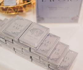 Lucky in Love card boxes stacked on a table with a thank you sign, adding charm to your Louisiana wedding celebration.
